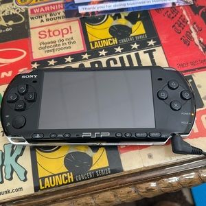 PSP with Case, Charger, and 7 games included